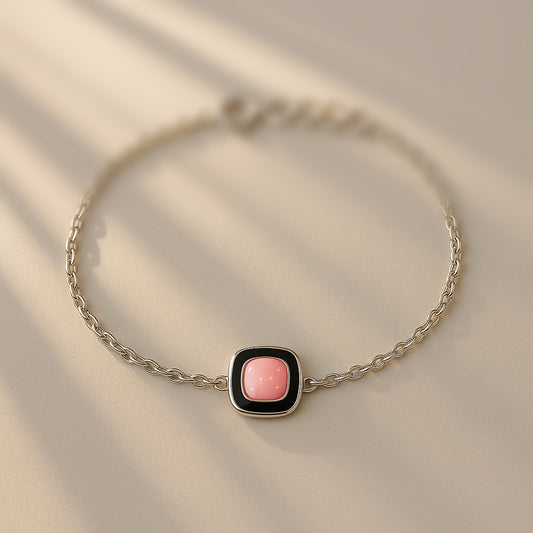 Elegant Silver Chain Bracelet with Pink Stone Centerpiece