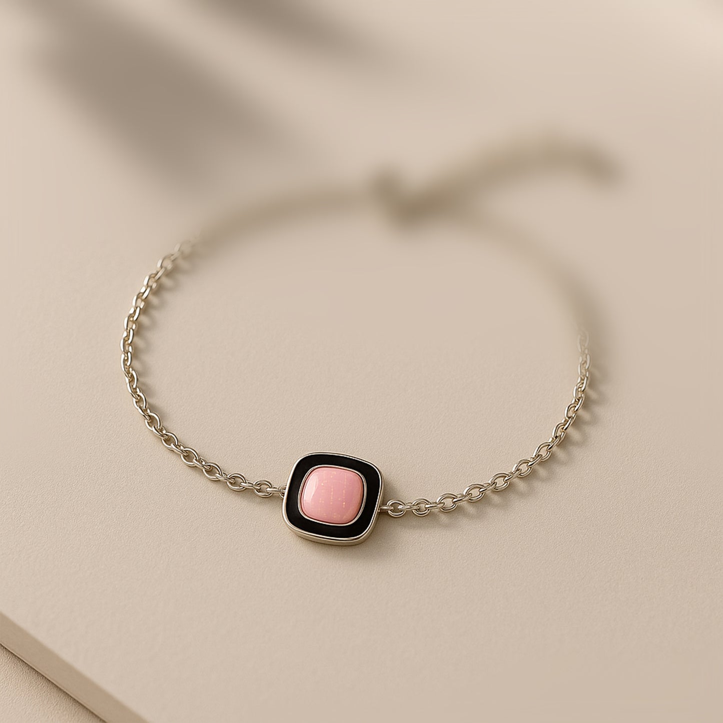 Elegant Silver Chain Bracelet with Pink Stone Centerpiece