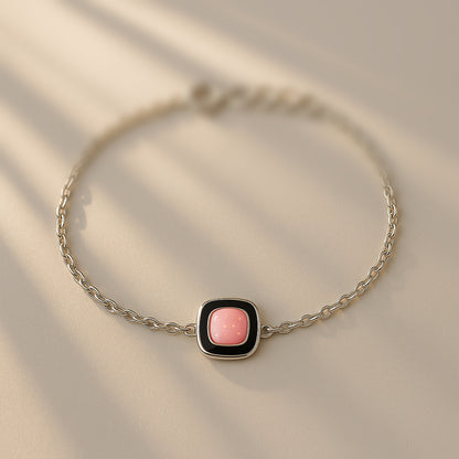 Elegant Silver Chain Bracelet with Pink Stone Centerpiece