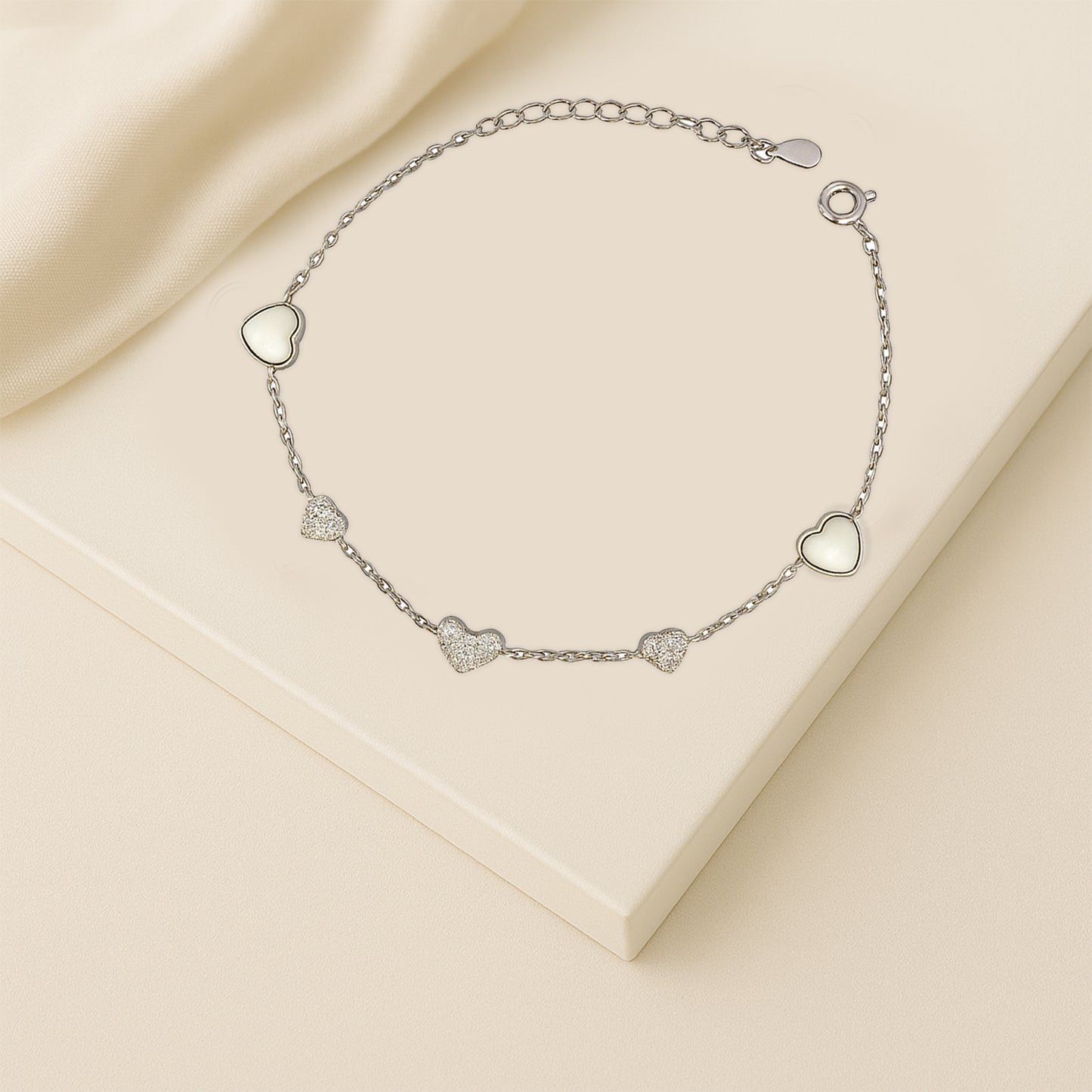 Silver Heart Charm Bracelet with White Enamel & Sparkling Accents